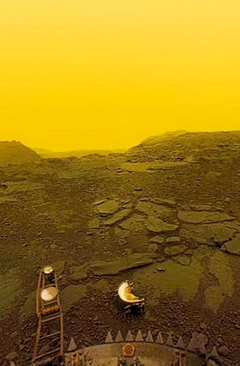 konstructivizm's tweet image. Surface of the planet Venus.Image captured on the surface of Venus by the Soviet Venera-13 lander probe.Venus&apos;s dense atmosphere filters sunlight, causing the sky on the surface to appear in a striking orange-yellow or golden hue.The terrain is covered with dark, basaltic rocks,…