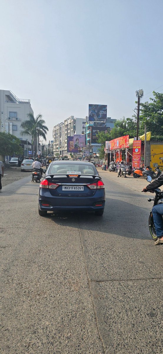 DGhatame's tweet photo. @bombaybench @mlj_goi @NagpurPolice @nagpurcp @HSPMaharashtra @Dev_Fadnavis Is it legal to use Judge sticker on Private Vehicle?? Whereas #BombayHighCourt ruling asked to take strict action against these vehicle. Please guide. Awaiting for Justified Response. #Justice https://t.co/vDdmOyQpJq