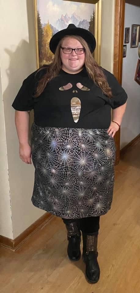 My wife came home from work yesterday completely destroyed. She'd spent hours making this Halloween outfit - hand-painted the shirt design, sewed that intricate web pattern on the skirt from scratch. I watched her working on it for weeks, staying up late perfecting every detail.