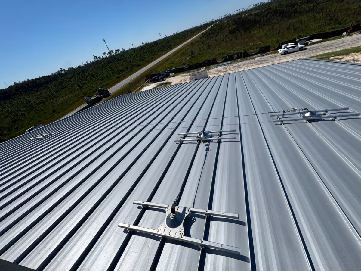 KStrongInc's tweet image. Day 3 at Fire Station 4, Tyndall AFB! The engineered posts are secured, and we're pulling the HLL lifeline cable—the core of this reliable fall protection system. Get a quote: systems@kstrong.com.
#KStrong #FallProtection #Safety #HLL #TyndallAFB @OSHA_DOL @ansidotorg