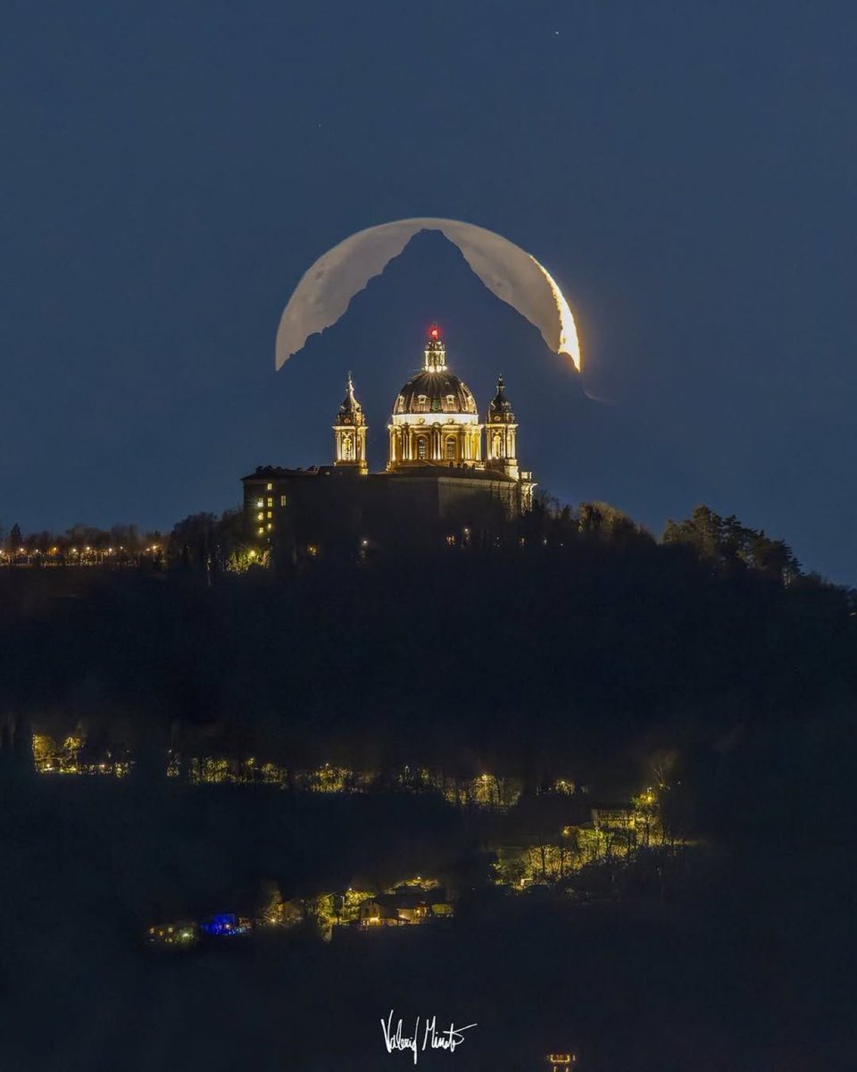 awkwardgoogle's tweet image. Italian photographer Valerio Minato waited six years to capture a perfectly aligned photo of the moon, mountain, and basilica