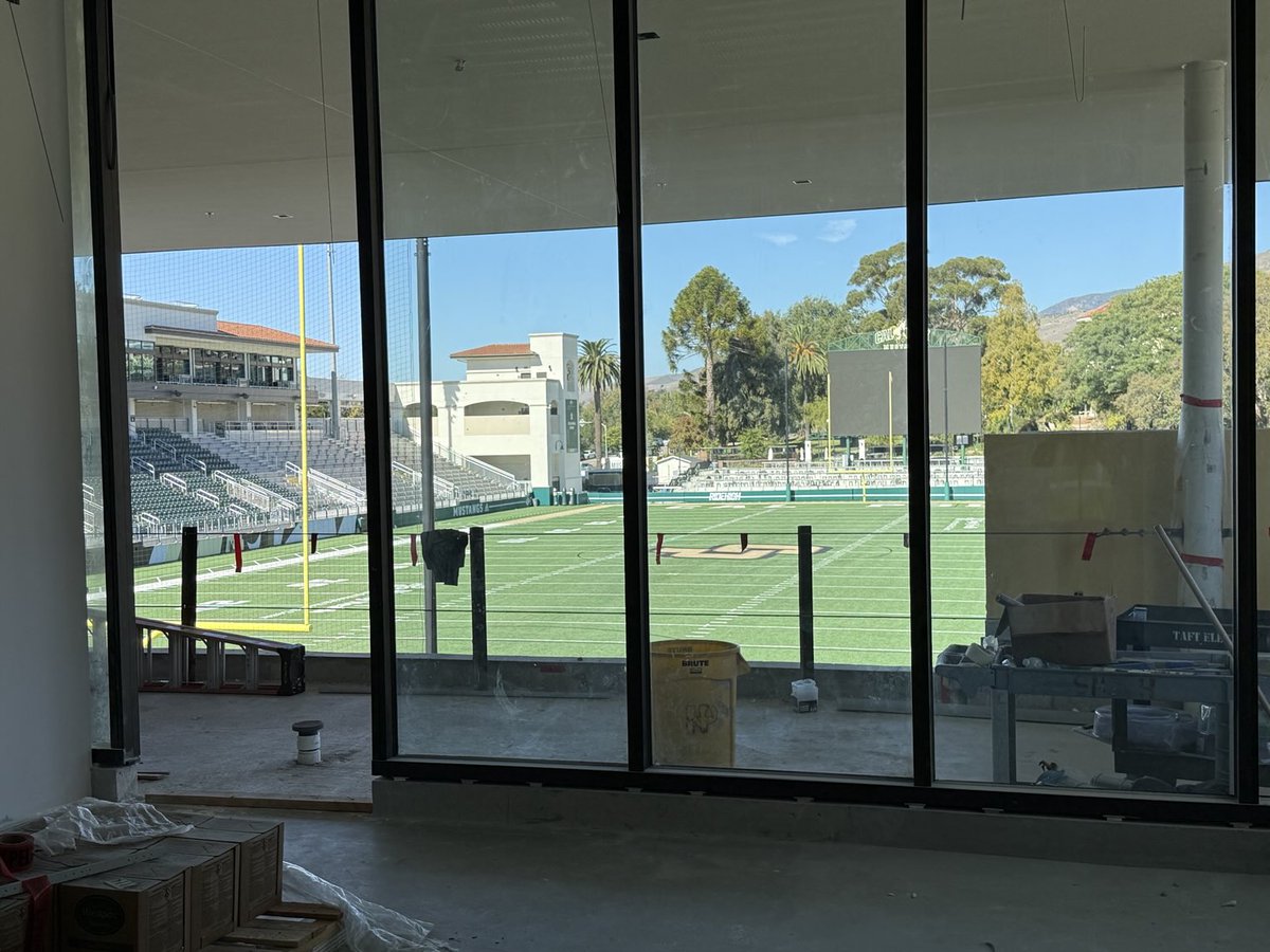 DonOberhelman's tweet image. John Madden Football Center photo updates from today! View from main entrance, then weight room w/roll up doors, interior lobby, and view from head coach office.  @CalPoly ⁦@calpolyfootball⁩ #CalPoly. It is coming along nicely!!