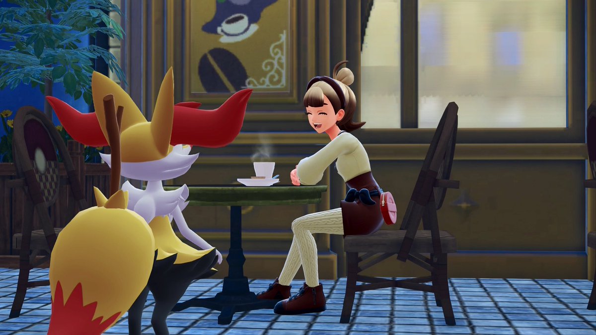 The photo mode in Pokemon Legends: Z-A is so adorable! You can actually have coffee at a cute little cafe with your Braixen 🥹
