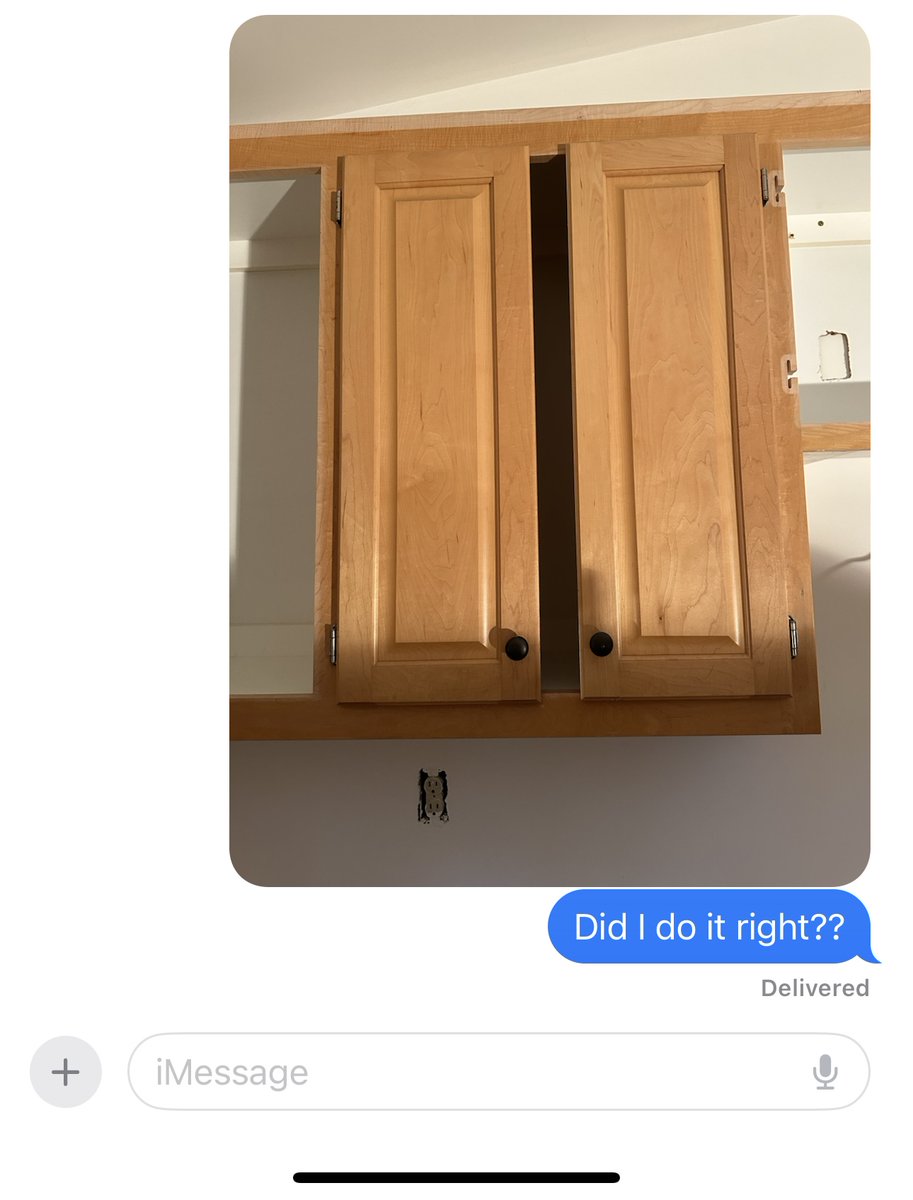 Installing the cabinet doors and sent this to my husband to mess with him lol