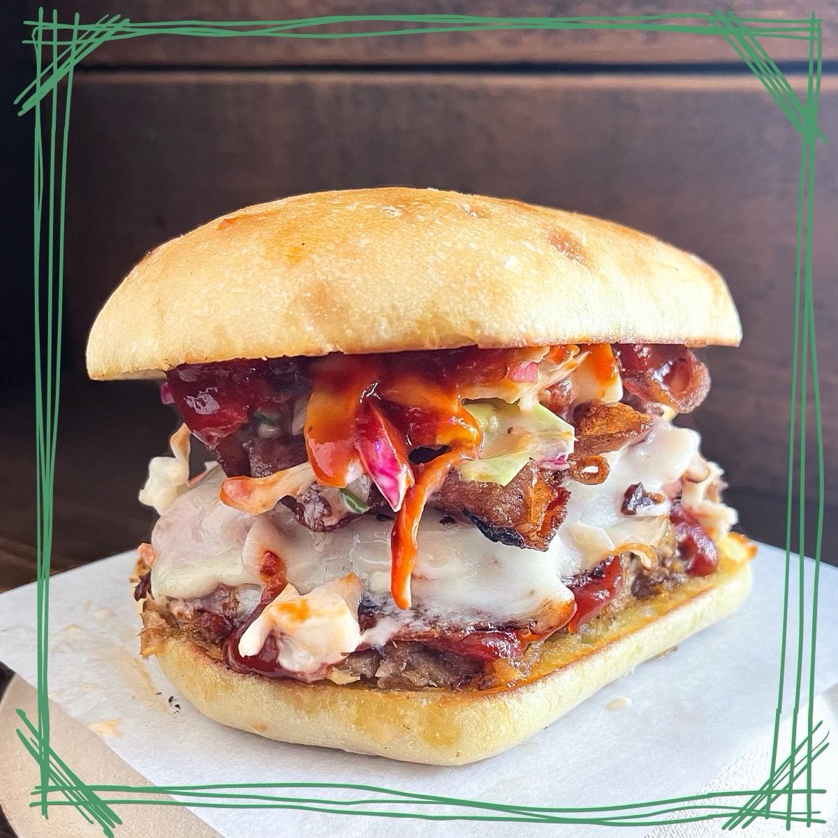 Bite into the epic deliciousness of our Bad Lieutenant Sandwich! Savor layers of pulled pork, ham, bacon and provolone, topped with chipotle BBQ sauce and apple/jalapeño slaw. It's a crowd-pleaser! 🥪😍 #NowMakeMeASandwich #BadLieutenantLove 🙌