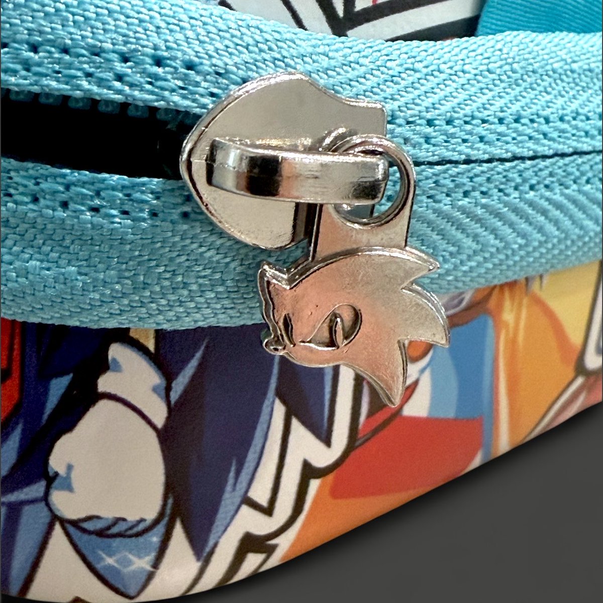 It’s all in the details! 

Every detail of our designs is meticulously planned, down to the smallest parts like the custom zippers on our Sonic CrossWorlds Switch 2 case! 

This design is sold out, but look forward to new designs coming soon!