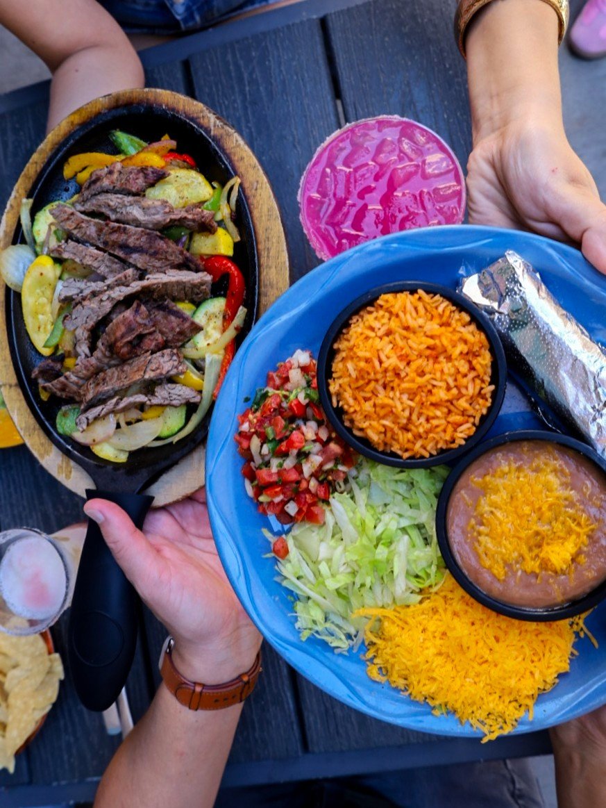 Nothing brings people together like a sizzling skillet of our Signature Steak Fajitas — loaded with bell peppers, onions, squash, and zucchini. Served with all the fixings and perfect to share, if you can 😉🔥