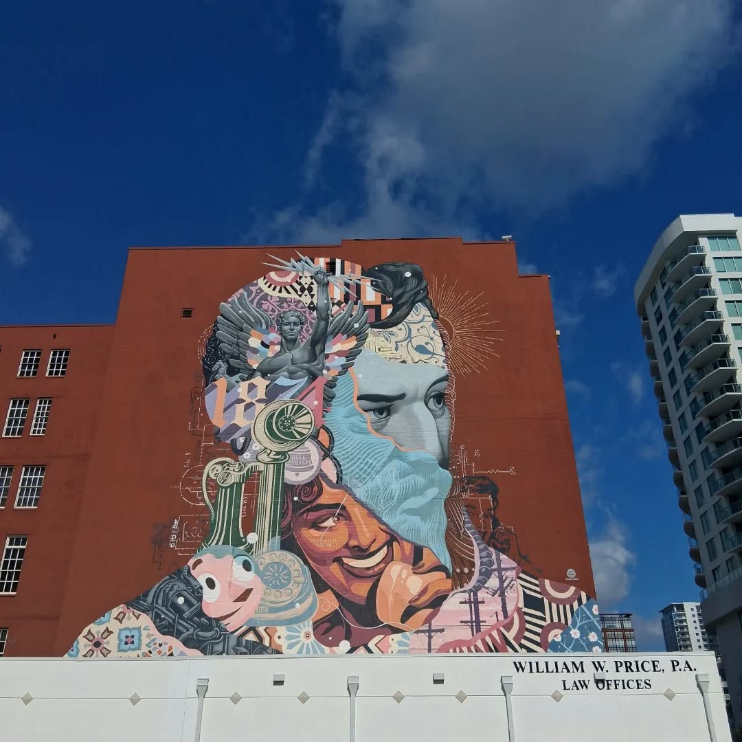 .<a href="/tristaneaton/">Tristan Eaton</a>'s “Spirit of Communication” transforms the façade of Alexander Lofts (326 Fern Street) into a striking homage to creativity, invention, and human connection, inspired by visionary Alexander Graham Bell. 📞🎨

📷: <a href="/cesar/">cesar</a>.add9 (via Instagram) 

#wpbARTS 
#MuralMonday