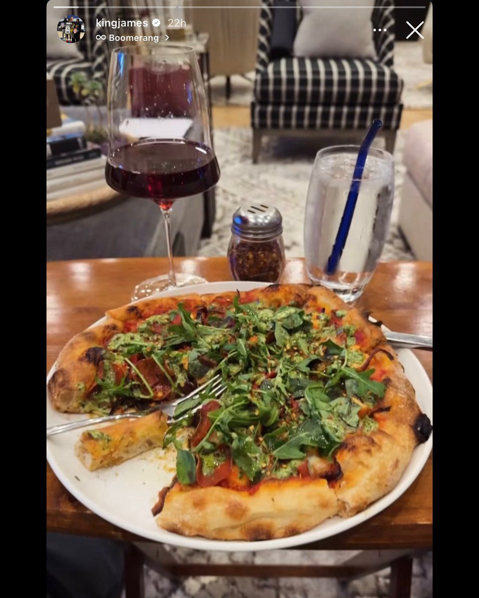 FearedBuck's tweet image. LeBron James shares a photo of himself eating pizza with a fork