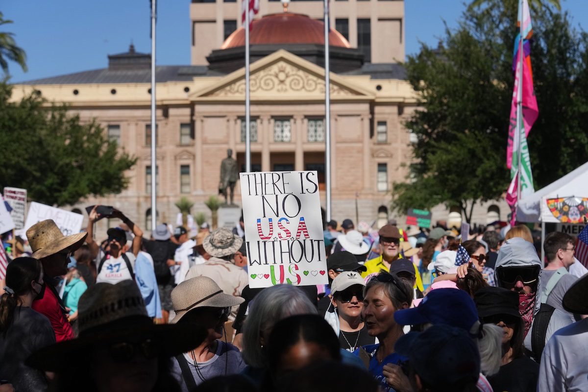 DanForAZ's tweet photo. Today I’m reflecting on Saturday at our State Capitol when Arizonans showed what democracy looks like. Between 14,000 and 15,000 Arizonans gathered peacefully at Wesley Bolin Memorial Plaza, alongside more than 60 peaceful #NoKings events across our state. https://t.co/qWNku2qbBt