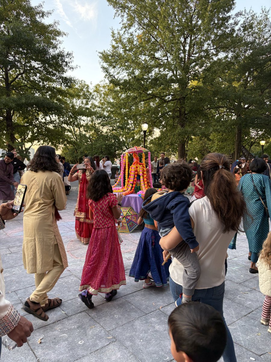 Diwali celebrations outside in a tiny corner of Manhattan on Saturday - colour, dancing, children joining in, a lot of fun
