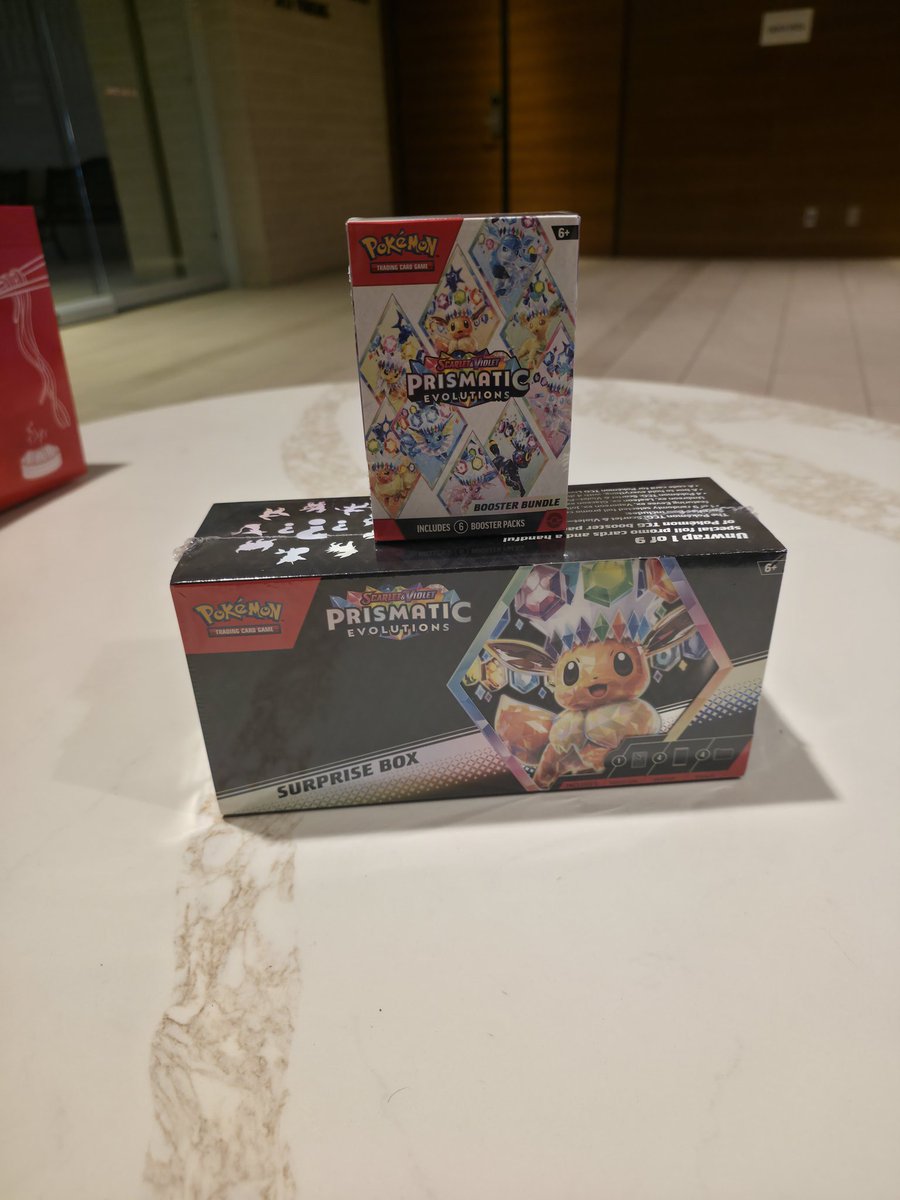 Shawntaylorjr89's tweet photo. Heading out of San Diego.. gonna be chillin at the airport so I figured why not crack some Prismatic ✨ Will I hit 🎯 or will I regret it ⁉️ #prismaticevolutions #pokemon #judgecomp #freecards https://t.co/BiN0UQpC65