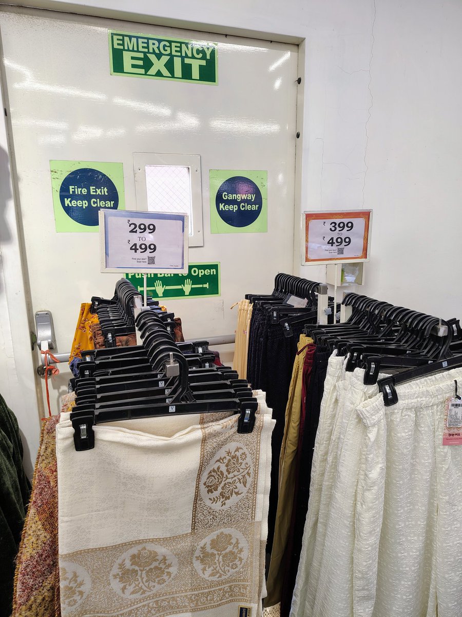 Ankit_gsits's tweet photo. @vmartretail Why do you guys even keep emergency exit door when you have to keep your clothes to block it. This store is near Veraval station https://t.co/ufzptIk6z6