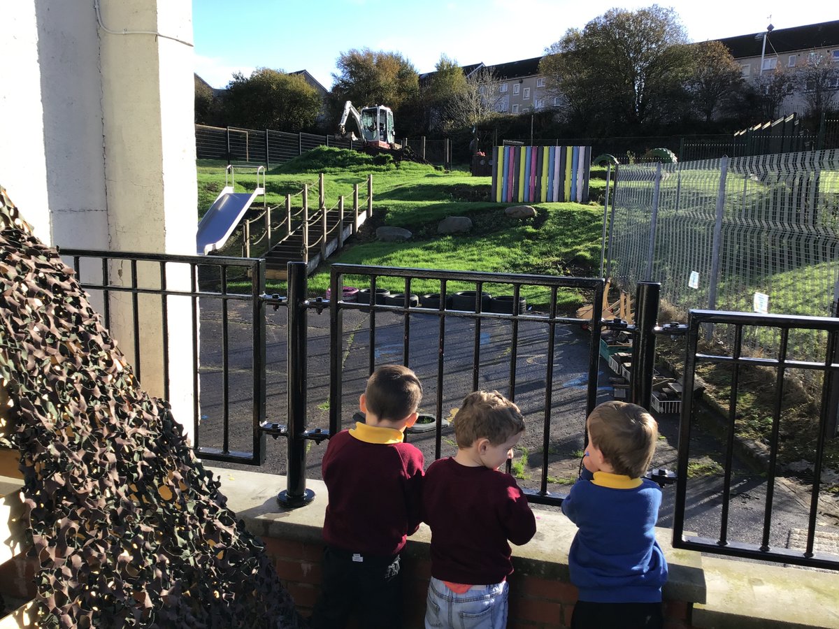 An exciting Monday morning for St Serfs nursery children As they watched the digger take the big hill down to make it a safer space to play.