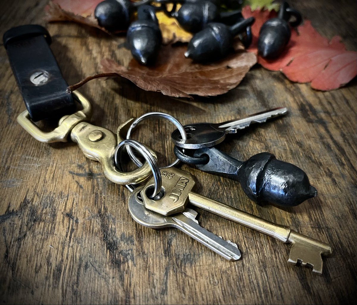 Acorn Keyring’s 🍂 🔑 

Tactile, classic, hand forged, blacksmiths acorns…

Every good smith likely has their very own acorn swage tool that they have made, meaning everyone’s is slightly unique to them, a small seed of their greater creative brain! 
 
#acorn #keyring  #Autumn
