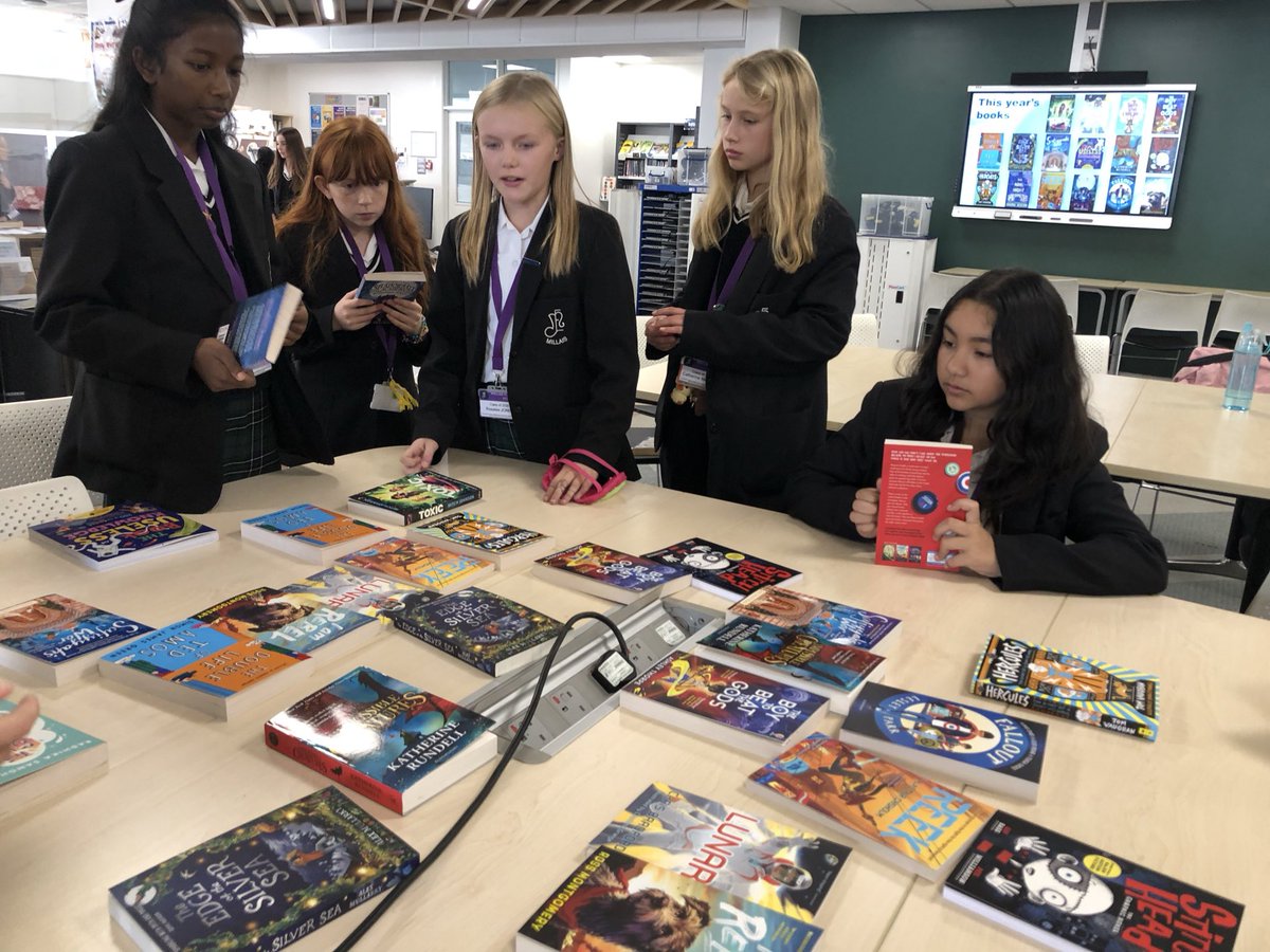 Around the #BookBuzz table. So many titles to choose from #MillaisEnglish #Year7 📚⭐️