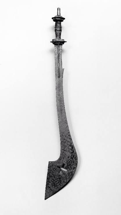 Edocentric_'s tweet photo. Benin Royal Ada, made from brass with the cross (road) symbol on it blade, reflecting the symbolism of the Ada, As a ceremonial scimitar that stands  between life and death. 

Representing the Oba's authority overlife and death, an innovation of ogiso ere  16 to 66CE. https://t.co/pRzID6317p