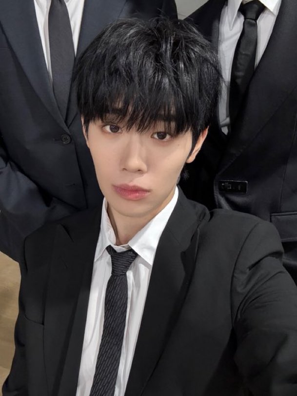 gunwook and ricky standing behind him to set the mood…girl what mood exactly are we setting?