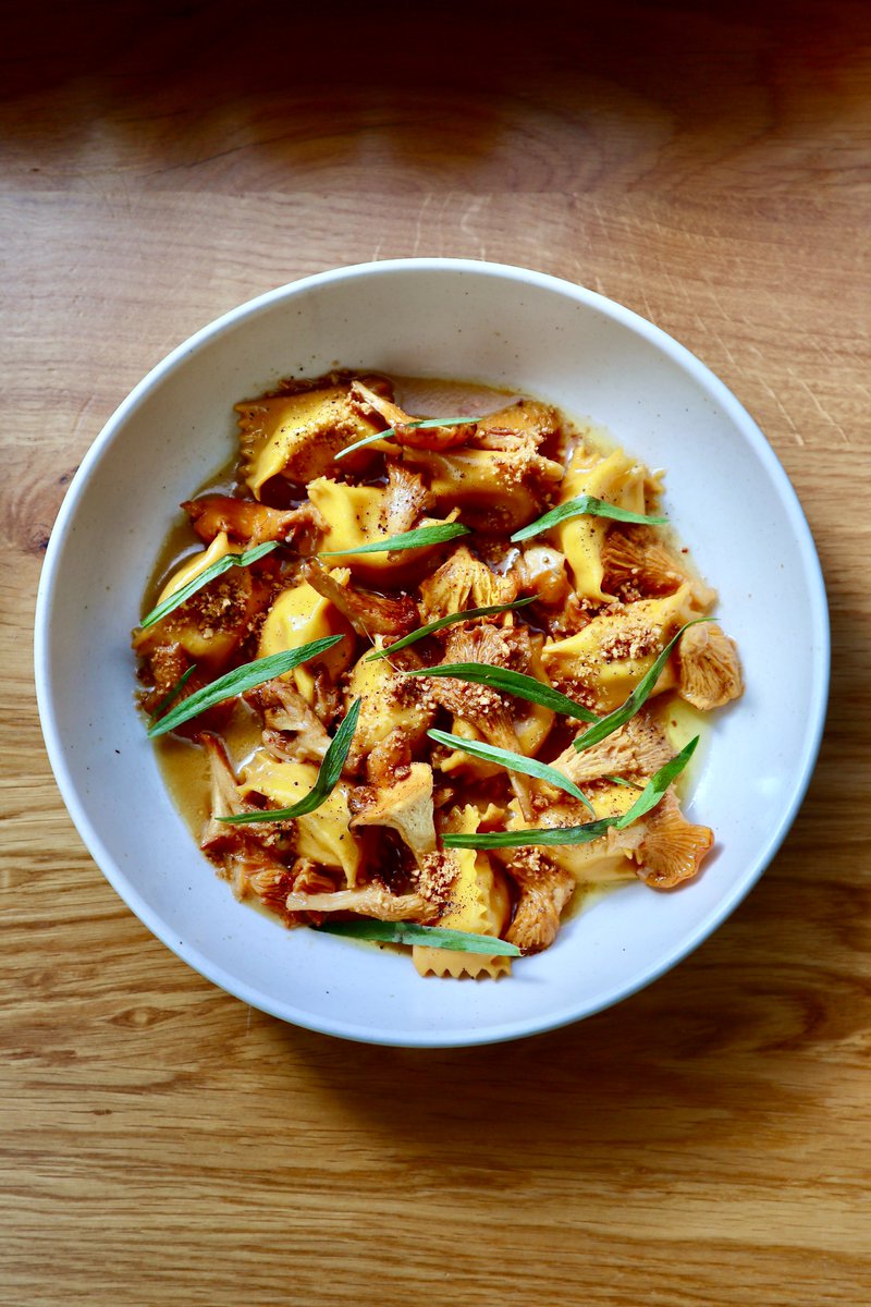 Little pillows stuffed with mascarpone and Parmesan are served with sautéed girolle mushrooms in a mushroom butter sauce

All topped off with crushed hazelnuts and picked tarragon