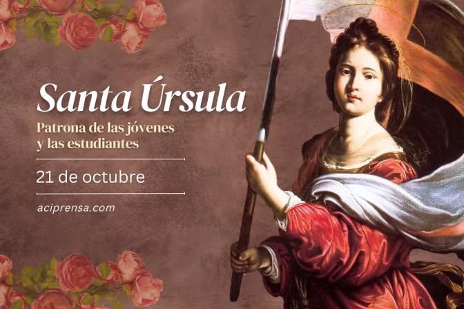 Painting of Santa Úrsula standing holding a flag with flowing banner dressed in red gown with white sleeves and blue accents surrounded by pink roses on maroon background text overlay reads Santa Úrsula Patrona de las estudiantes y la juventud femenina 21 de octubre aciprensa.com.