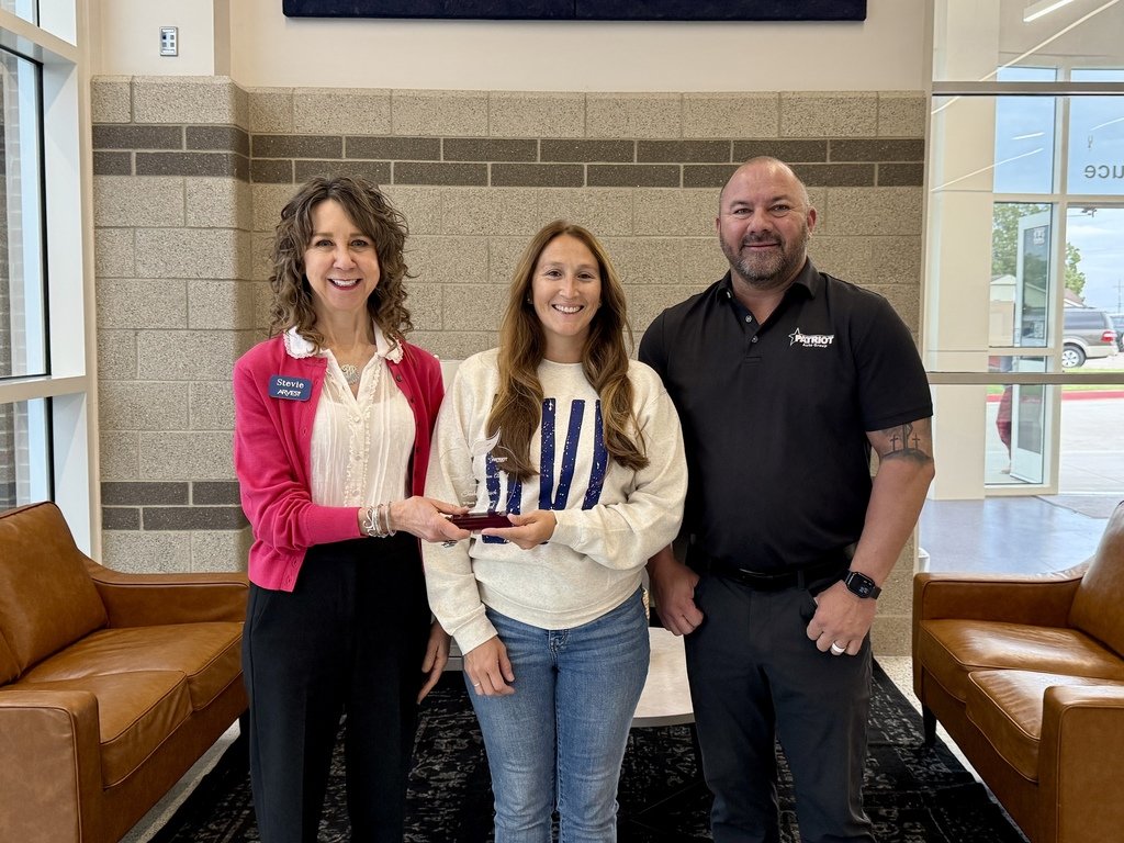 Wilson Elementary teacher Tasha Posch has been awarded a plaque and a $300 check for being selected a Bartlesville Teacher of the Month by Arvest Bank and Patriot Auto Group. #bvillebruwin