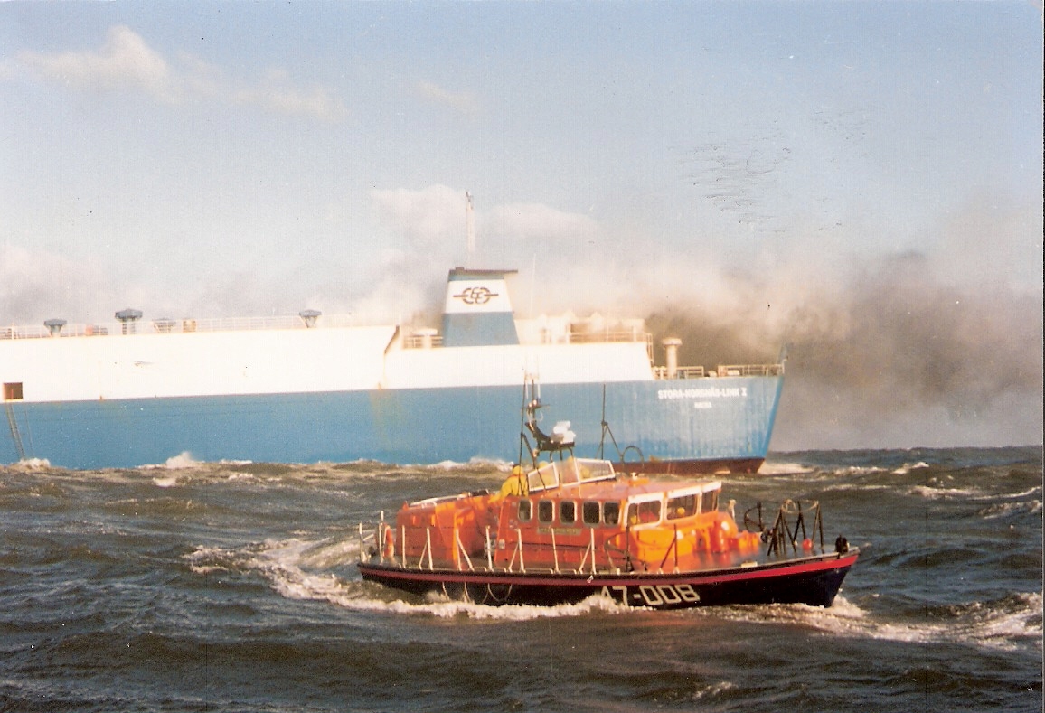 MuseumRnli's tweet photo. OTD 1991, the RNLB City of Sheffield responded to a 'Mayday' from the Ferry  'Stora Korsnas Link 1' which was on fire NE of Skinningrove in a onshore gale. Both Whitby and Hartlepool Lifeboats attended, the 18 crew of the vessel were successfully air lifted off by RAF Helicopter. https://t.co/KpNUsCdDCq