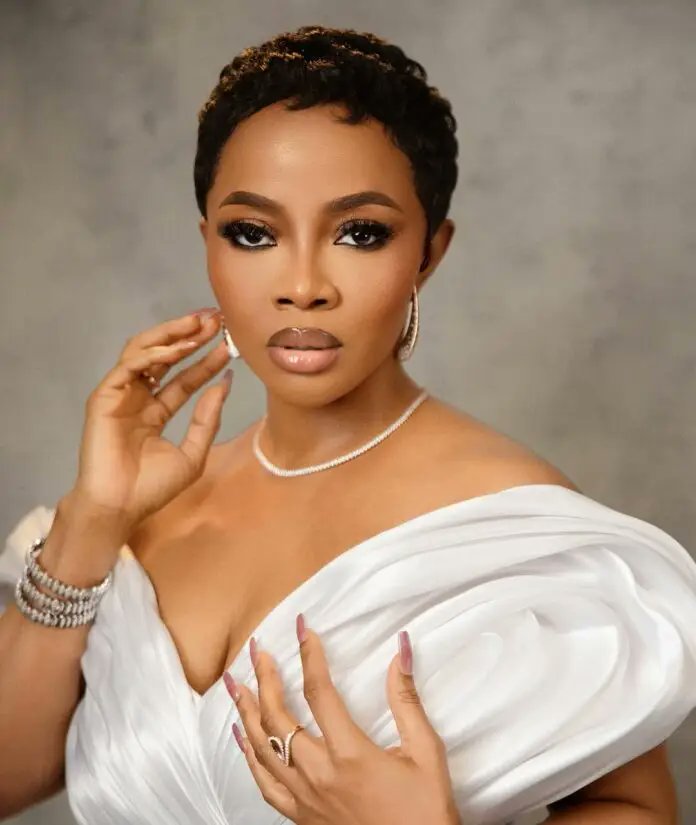 Toke Makinwa Biography

Toke Makinwa, born on November 3, 1984, in Lagos, Nigeria, and originally from Ondo State, is a renowned media personality, television and radio host, actress, author, entrepreneur, and fashion influencer