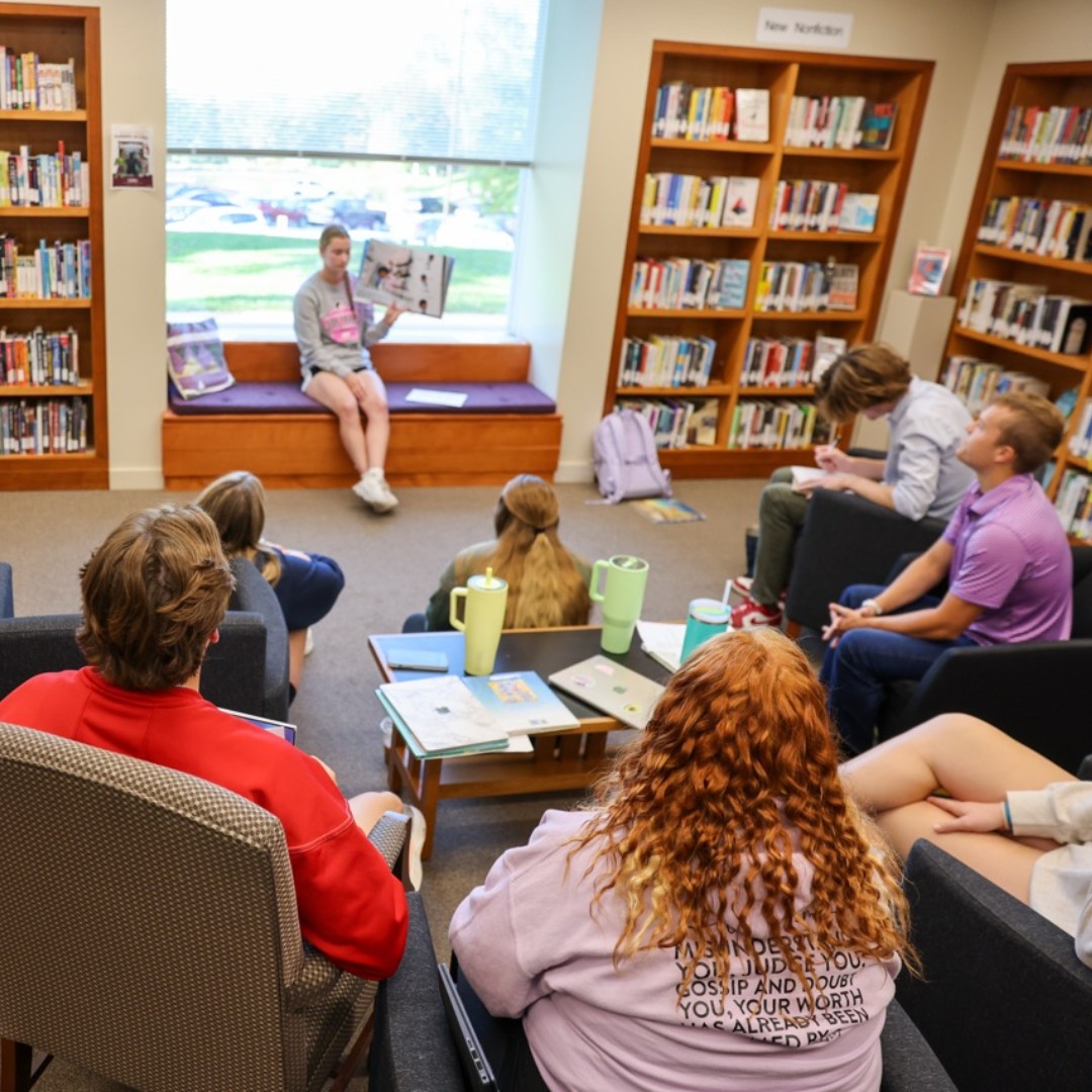 CornellCollege's tweet image. Students in Prof. Madison Parker’s Children’s Lit. class wrapped up their final by reading children’s books aloud to their classmates! What a creative way to showcase real-world teaching experience on the Hilltop! 💜📚 #CornellCollege #BlockPlan #FutureTeachers