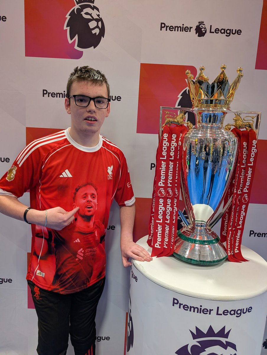 loob09's tweet photo. Aaron with the official @premierleague trophy, he was over the moon to see it, kept saying Virg lifted this actual trophy @MightyRed_LFC @LFC @VirgilvDijk https://t.co/C2Tbl1UEqD