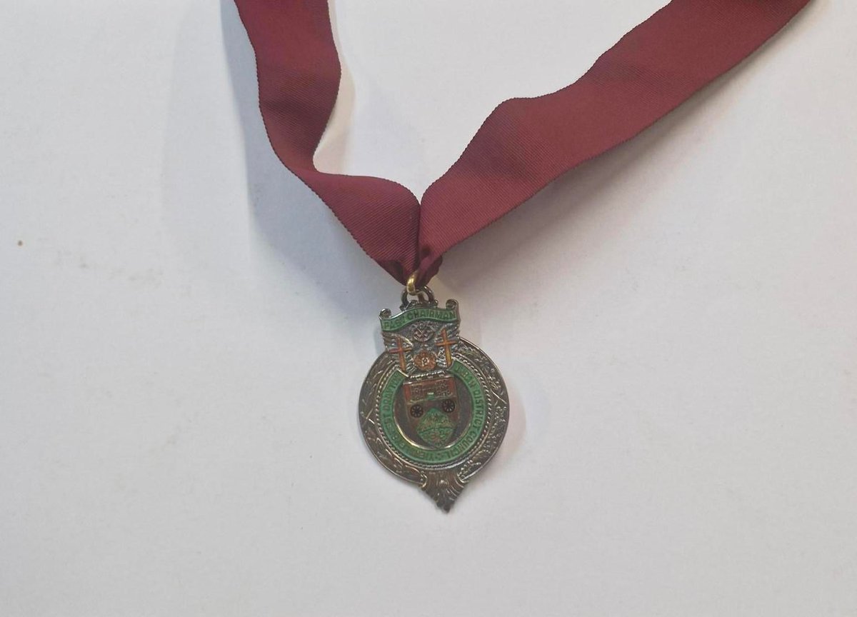 This medallion, edged with a maroon ribbon, bears the coat of arms of Yiewsley &amp; West Drayton Urban District Council. It was presented to a past chairman, marking service to the community. 

#MuseumMonday #HillingdonHeritage #WestDrayton #Yiewsley