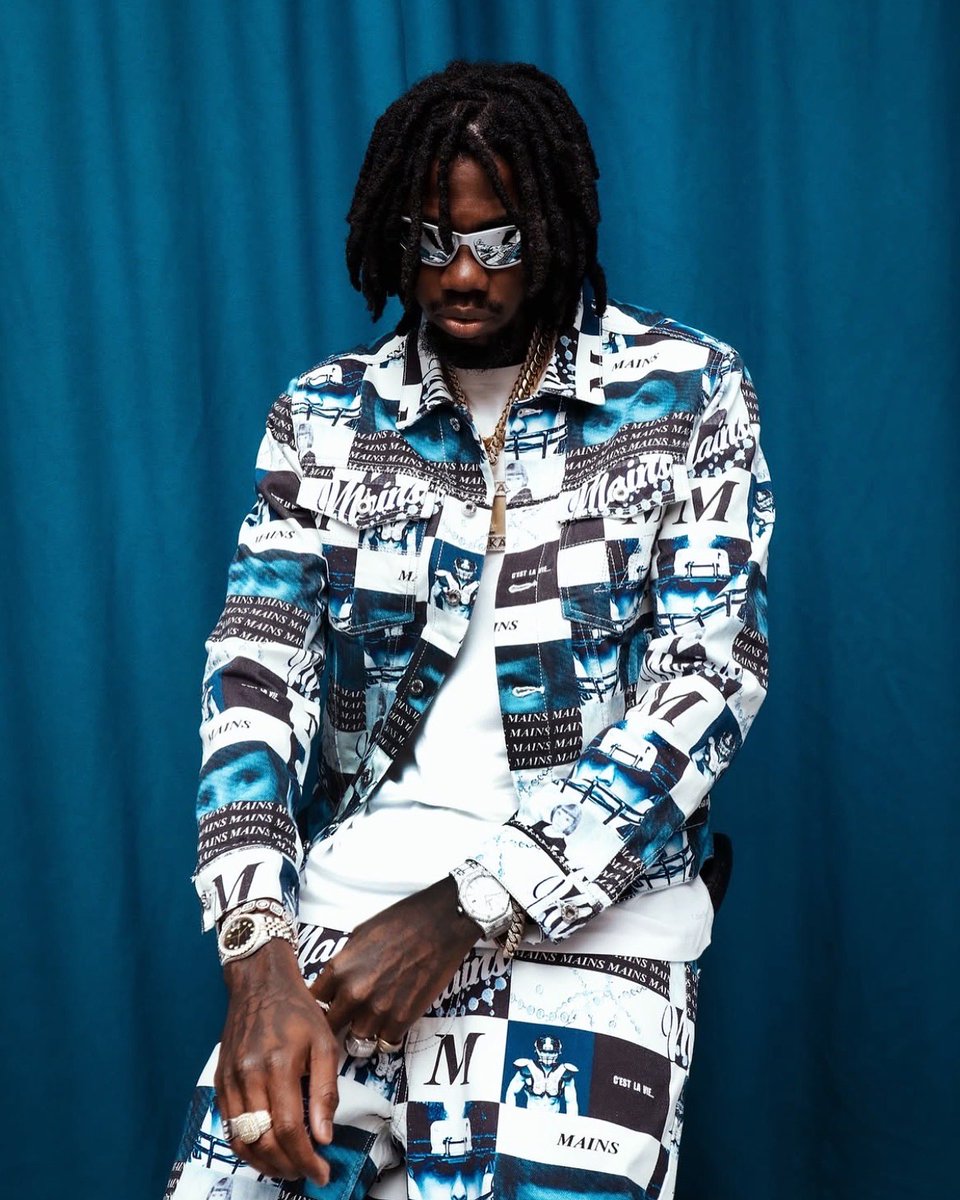 Skepta's tweet image. Alkaline wears #MAINS