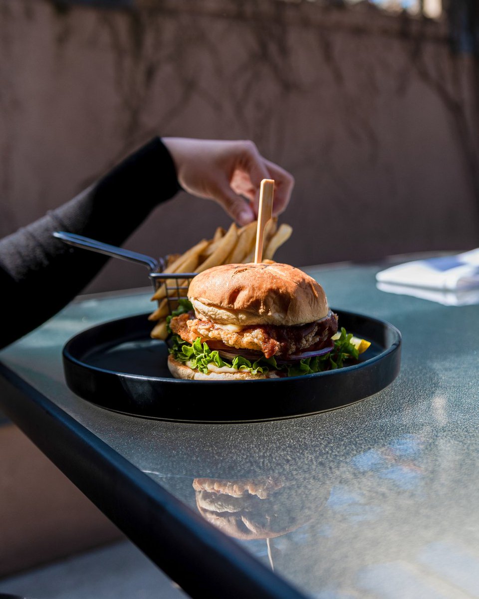 The perfect bite of comfort and crunch, our Crispy Chicken Sandwich is here for all your cravings at <a href="/CAVUKitchenBar/">CAVU Kitchen Bar</a>. #NationalSandwichDay