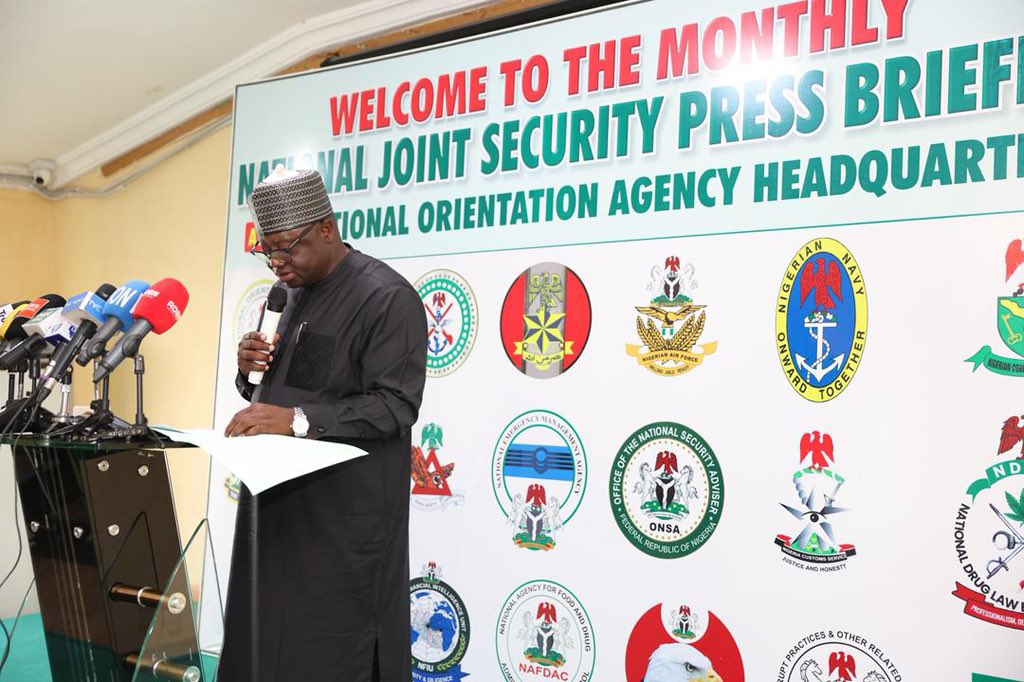 NOA_Nigeria's tweet photo. Security Situation Improved in October, Says DG NOA 

At the November edition of the National Joint Security Briefing, the Director General of the National Orientation Agency (NOA), Mallam Lanre Issa-Onilu, reported a notable improvement in the nation’s security situation during October, reaffirming that data-driven collaboration and citizen intelligence are central to sustaining national peace and safety.

Speaking on the security situation in September, Issa-Onilu disclosed a 33% increase in intelligence coordination and improved rapid response, particularly in Kogi and Zamfara states, highlighting the successful recovery of high-value caches in the North-West and South-East, alongside a 12% reduction in fatalities from violent crimes.  

On anti-corruption and transparency efforts, the DG, who reported that the Independent Corrupt Practices and Other Related Offences Commission (ICPC) received 44 petitions, concluded 15 investigations, filed five new cases, and secured two convictions, also  noted that N840 million and $919,000 were recovered, 35 public health projects were monitored, and nine anti-corruption units were inaugurated to strengthen accountability across sectors.  

For 2025, he noted that N46 billion and 125 properties have been recovered so far by EFCC, adding that over N100 billion of the recovered funds have been reinvested in the Students Loan Scheme and the Consumer Credit Scheme, reinforcing that  the government is ensuring that every money recovered from corruption works for the people.

He also highlighted remarkable achievements made by the NIS, NDLEA, FRSC, NAFDAC and other regulatory and security agencies 

In his remarks, the Deputy Force Public Relations Officer, CSP Victor Isuku, revealed that the Police Force has instructed all divisional offices to place suggestion boxes outside their stations, providing the public with an easy and secure way to share information with the police.  

The security briefing was attended by representatives from key government agencies, including the Nigerian Army, Navy, Correctional Services, EFCC, Ministry of Foreign Affairs, NFIU, NDLEA, ICPC, DSS, and several others.
