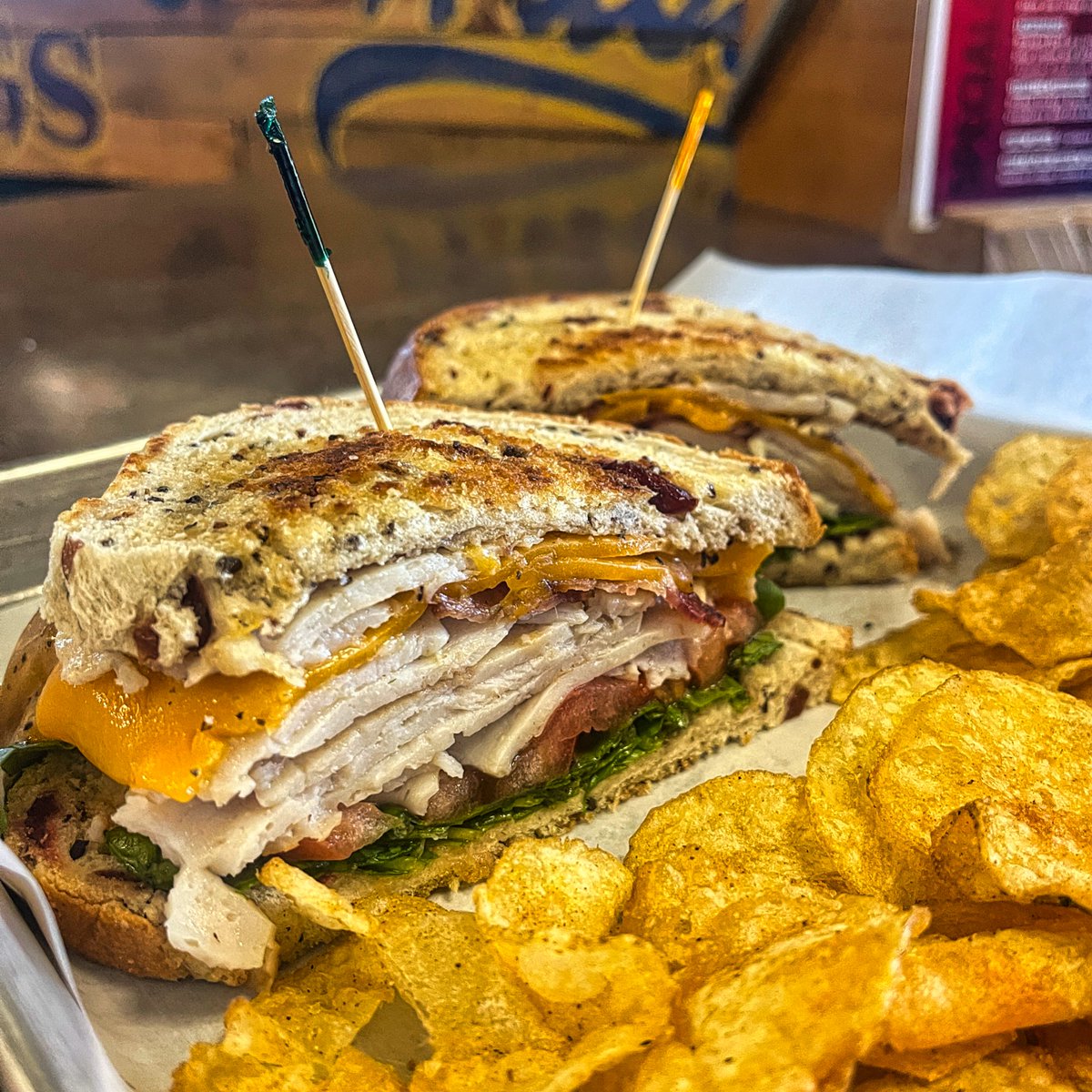 'Tis the season for TURKEY! Who are we to fight it?!
The Turketta Sandwich with grilled turkey, bacon, cheddar cheese, arugula, tomato and balsamic vinaigrette on cranberry wild rice bread!
It's one of our November Specials! Try it today!