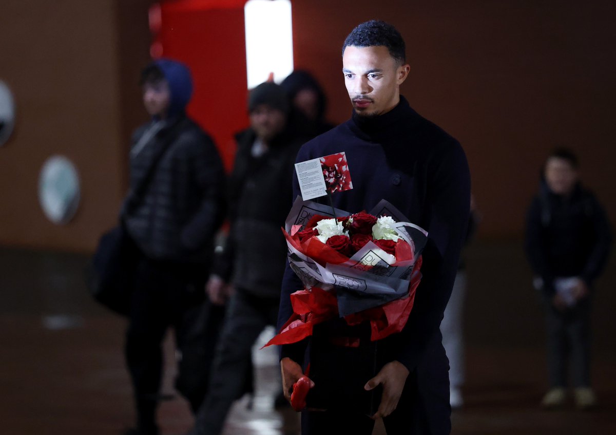 Trent Alexander-Arnold lays down a wreath at the memorial for Diogo Jota outside Anfield ahead of his return with Real Madrid tomorrow night.