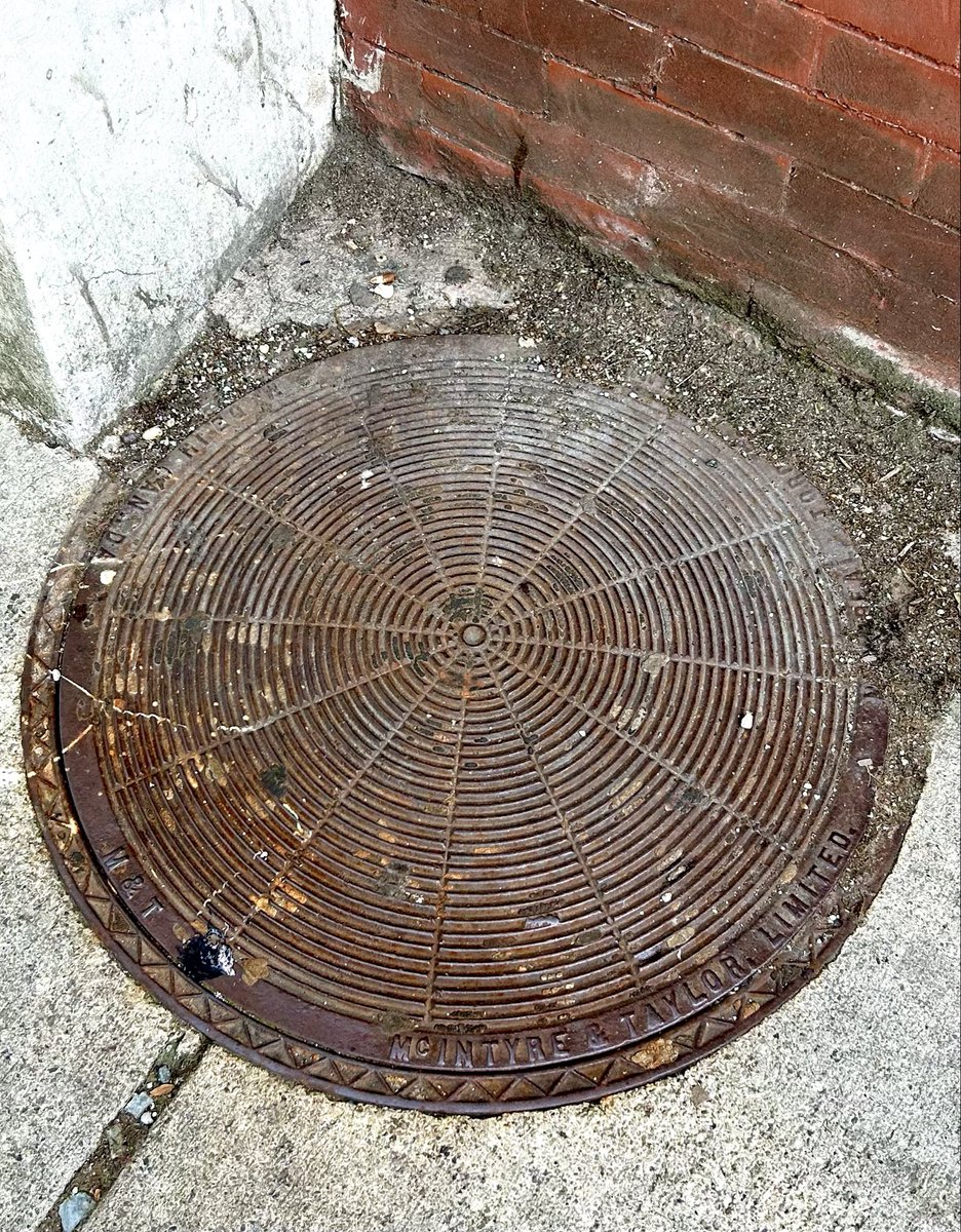 Another McIntyre &amp; Taylor cover near Bathurst and Bloor. This one is slightly domed and has Toronto spelled correctly. 
#manholecoverMonday