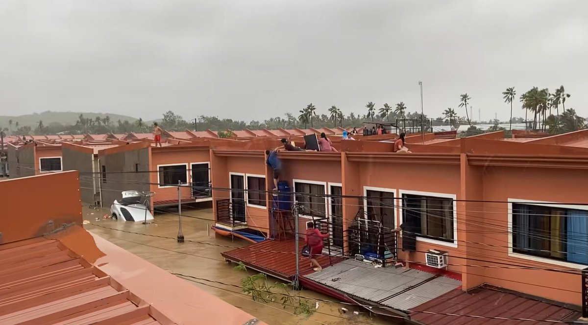 bncdotph's tweet photo. LOOK: Residents in Cebu were forced to take shelter on the second floors and rooftops of their homes as floodwaters rose over a meter due to Typhoon #TinoPH.

📸 Karla Faye L. Evangelista/Facebook https://t.co/Rb3wmufLhg