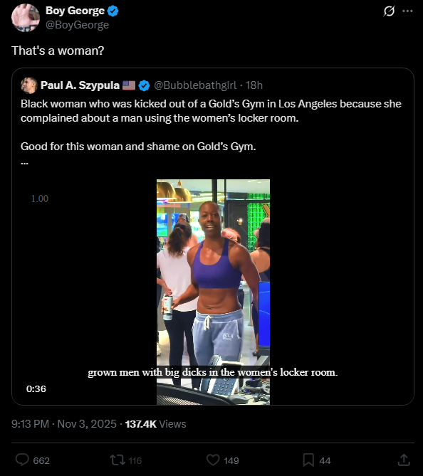 Screenshot of a quoted X post by Paul Szypula showing a photo of a black woman in a blue sports bra and gray leggings standing in a gym locker room area with other women in the background, alongside text complaining about her being kicked out of Gold's Gym in Los Angeles for protesting grown men with big dicks in the womens locker room, and calling to complain about and shame Gold's Gym.