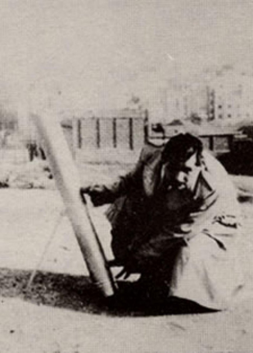 Famous image of anarchist anti-Francoist guerilla Quico Sabaté firing a mortar loaded with propaganda leaflets over Barcelona in 1955.