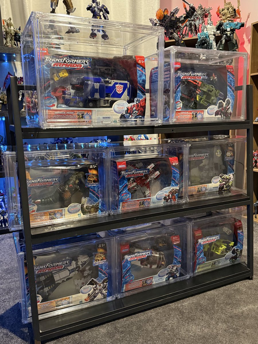 displacedzebra's tweet photo. Finally got some display boxes for my sealed Armada collection. Tried making an “island” in my room since they’re double sided, and sacrificed my Primes shelf for the blistered stuff.#Transformers #transformerarmada https://t.co/XwJEsawJda