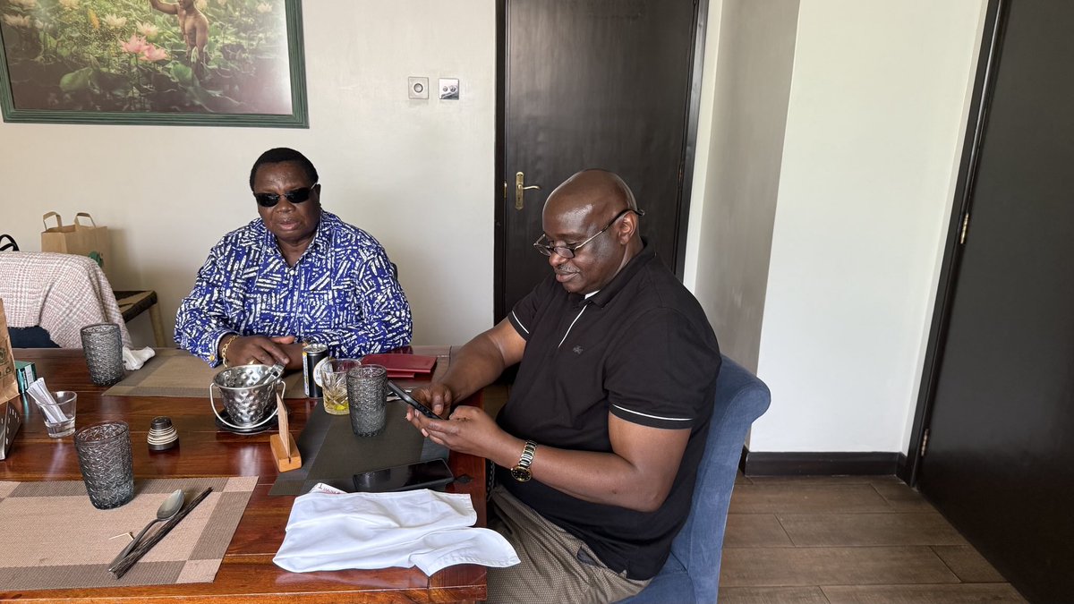 With my brother in law John Mwai Andiwo MPESA as we discuss national matters over lunch. God Bless.