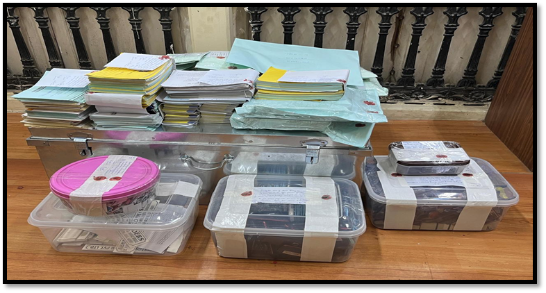 dir_ed's tweet photo. ED, HIU, New Delhi, has conducted search operations on 29/10/2025 at multiple locations in Mumbai under PMLA, 2002 in connection with ongoing investigations against M/s Varanium Cloud Ltd., its Promoter Harshavardhan Sabale and other associated entities. During the searches, various incriminating documents, digital devices, 400 cheque books linked to mule bank accounts and more than 200 SIM cards, contained in more than 100 dual SIM mobile phones were recovered and seized.