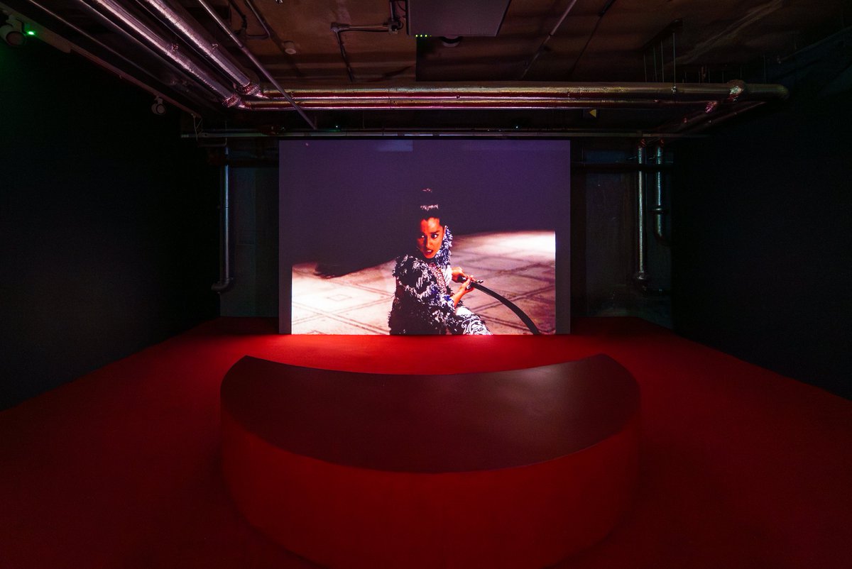 Sophia Al-Maria participates in ‘Paradigm Shift,’ a group exhibition at 180 Studios, #London, presented in partnership with Ray-Ban Meta.

📅Until 21 Dec 2025
📷 1) Sophia Al Maria, Tiger Strike Red, 2022.
2) Installation view, Paradigm Shift, 180 Studios. Photo by Feiyang Xue