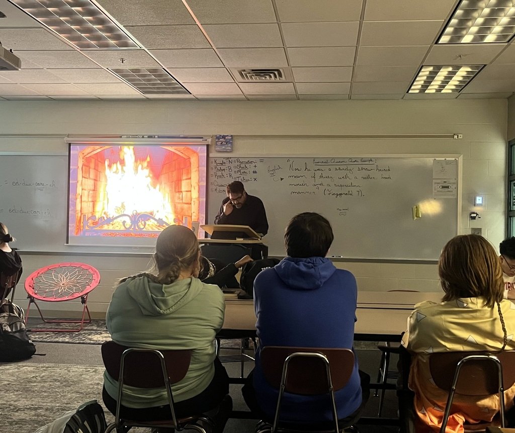 PHSCCADMIN's tweet image. Mr. Adam Depew took a few minutes during his classes on Halloween to read to his students, The Tell-Tale Heart by Edgar Allan Poe, with passion, humor, and energy.  As a result, students experienced the joy of literature and the emotion that great stories can evoke in  us.