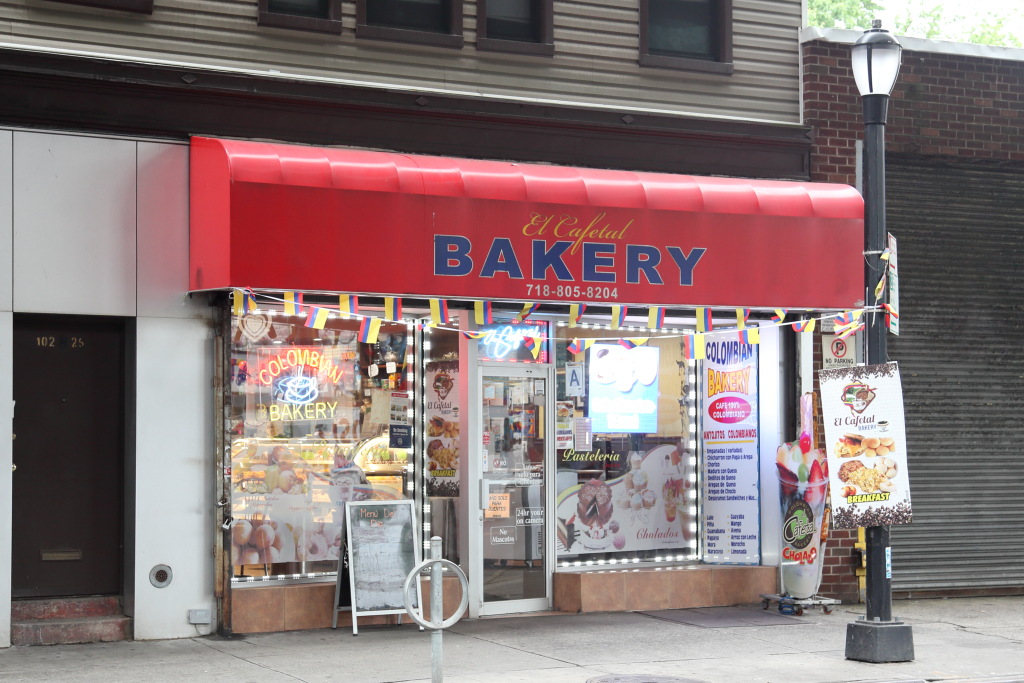 An almojábana, my favorite Colombian cheesebread, at El Cafetal, 10225 Jamaica Ave., Richmond Hill, Queens. If you'd prefer pan de bono, pan de yuca, or perhaps even something sweet, no worries — the extensive bakery display offers many temptations.