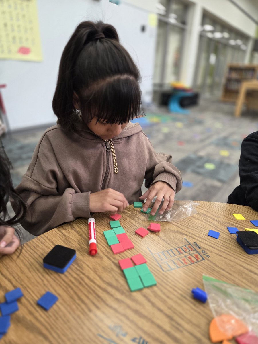 Building and comparing fractions with 4th grade. Tactile learning brings math to life in the #BCEMotorLab.