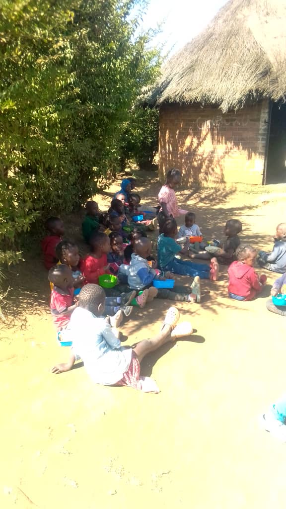 Semalho's tweet photo. We are running our kitchens with limited supplies. We have had to cut down our portions but make sure each child gets something to eat daily.  We have a very vibrant team of mothers and sisters who help us at the Kabonera kitchen. https://t.co/FsiKPntSxR