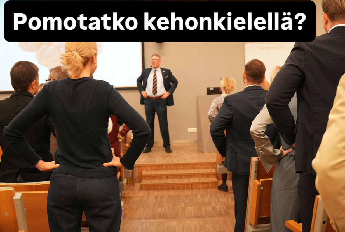 Whose the boss? Mr. Body Language offers power and dominance gesture handshake and shows power stance @ Baltic Sea Business Networking Conference @ Latvijas Universitate.

It is said that offering hand palm side upwards historically comes from royalty and heads of churches.