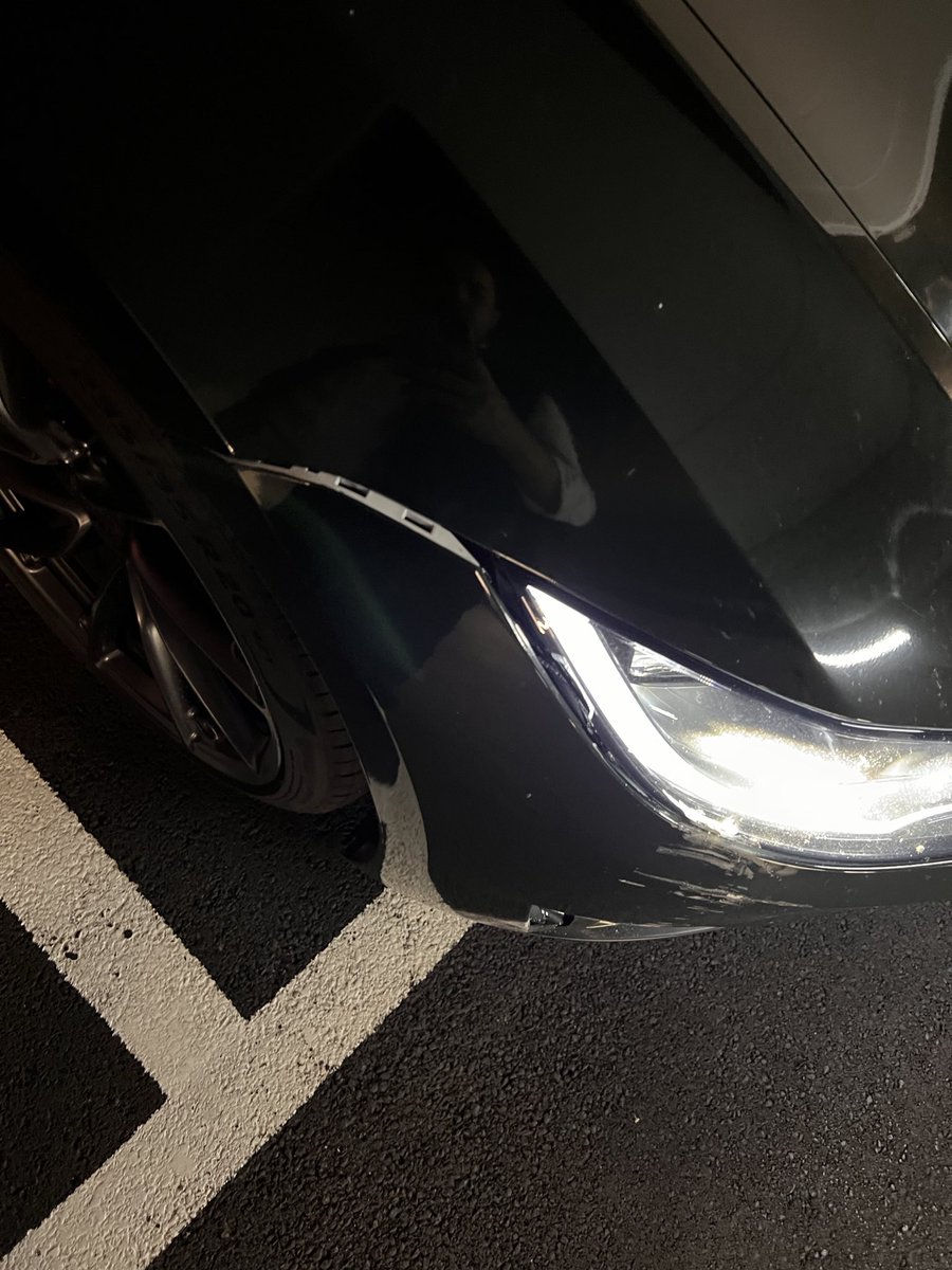 mspringsits's tweet photo. Here’s the damage and the wall it hit. The wall/floor colors are low-contrast in this lighting. There was no warning that Autopark might disengage or that extra caution was needed. If it failed to detect the boundary/obstacle, why isn’t that a system malfunction? @teslaeurope https://t.co/VQ55i8xIsQ