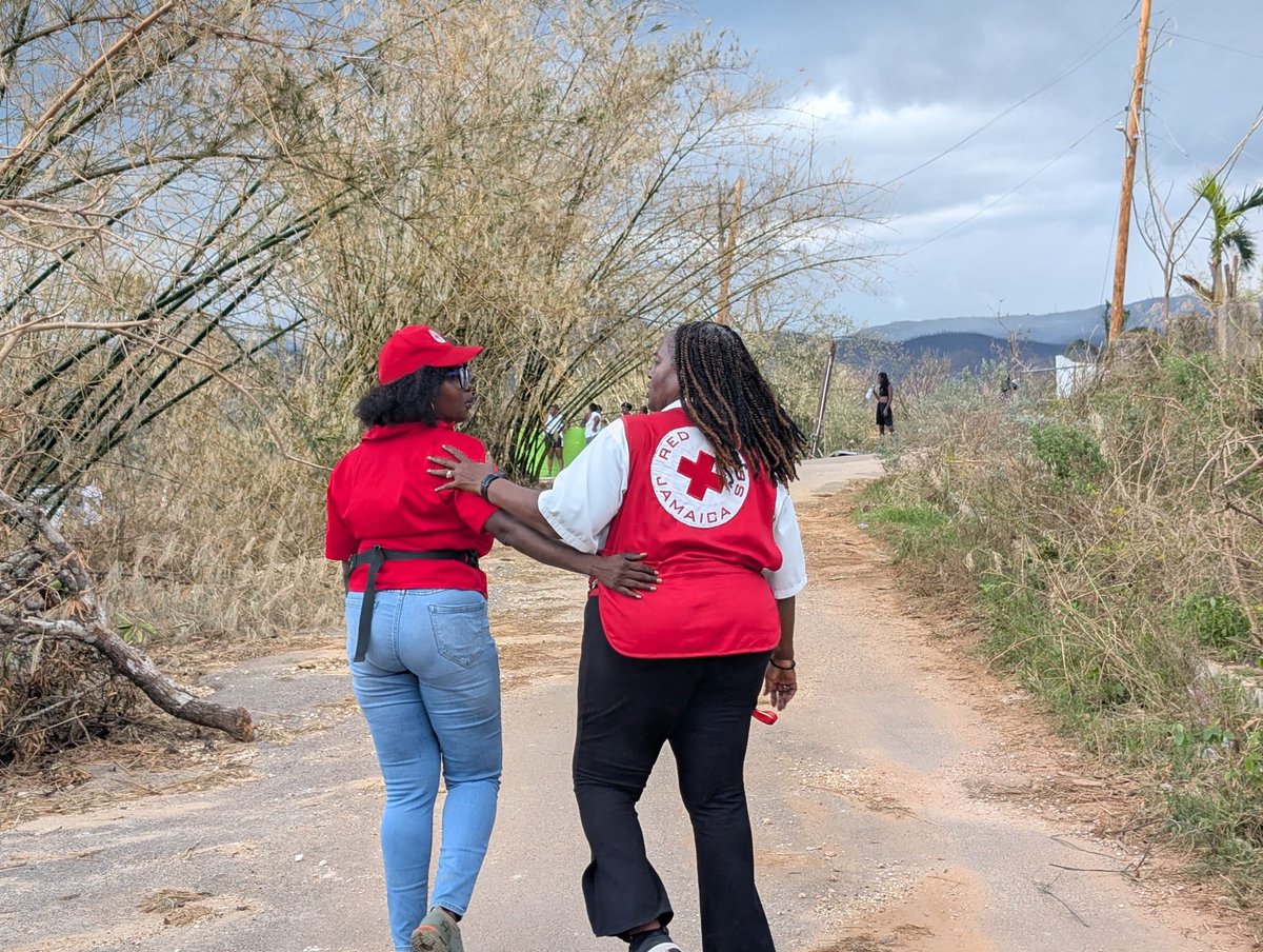 For those hurt by #HurricaneMelissa, the #JamaicaRedCross represents help, hope and support. JRC rep Donna Thomas and Holland Primary principal Simone Doctor shared a moment of grief and mutual support as they surveyed the damage done to Holland Village: We will build back better